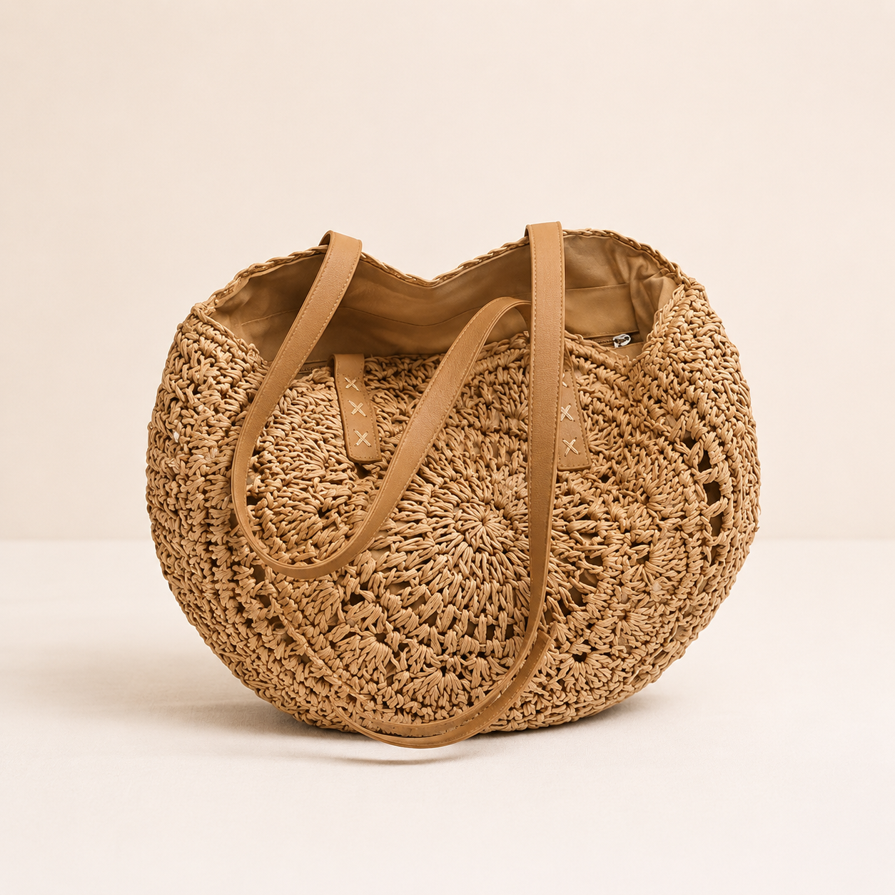 LOLA - BOLSO TEJIDO REDONDO CON MOTIVO