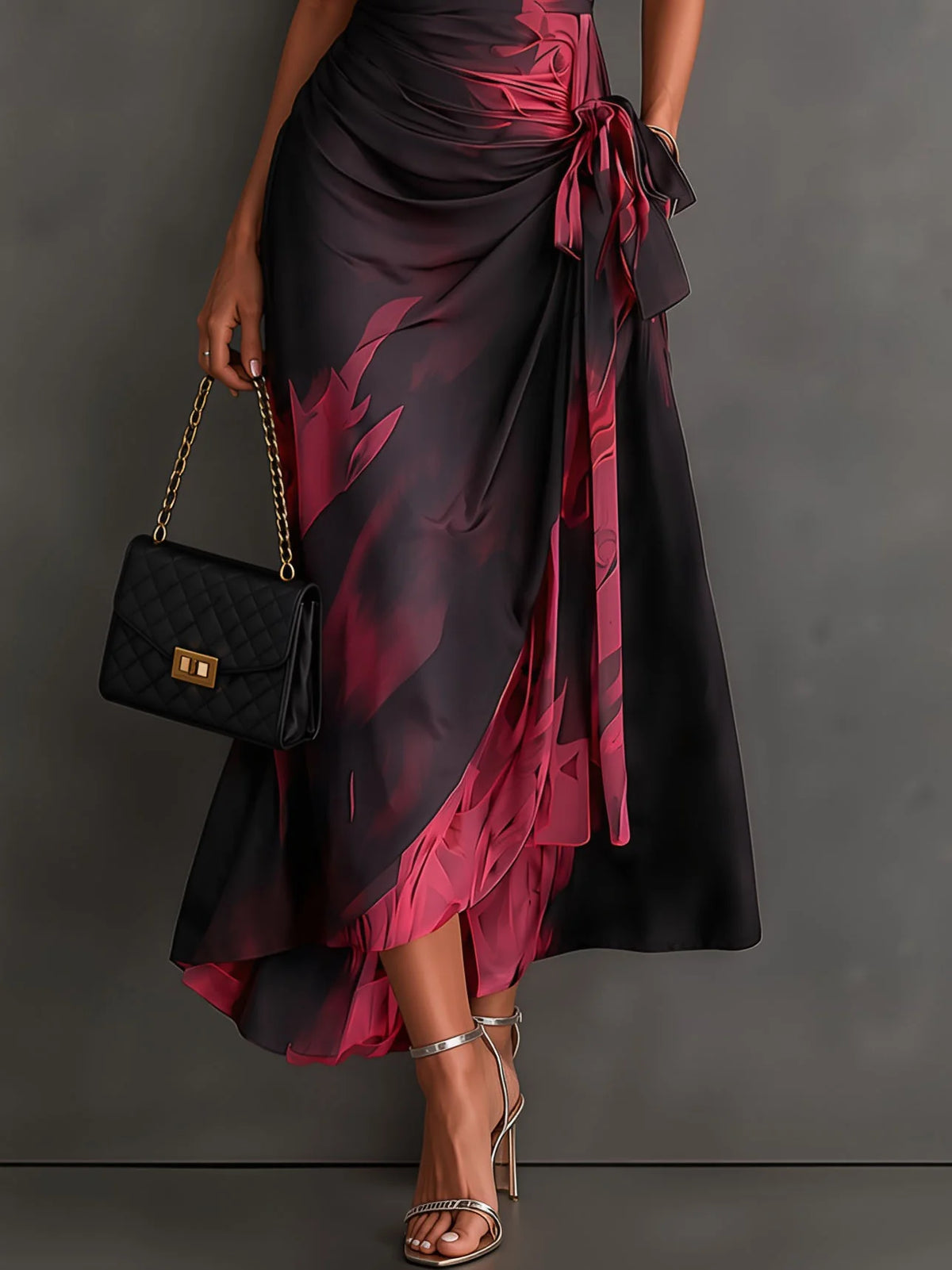 Sara - Vestido midi cruzado con estampado abstracto rojo y negro, cuello en V, manga corta, cinturón y bajo asimétrico con volantes.